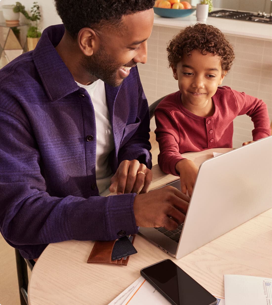 Father and son learning together